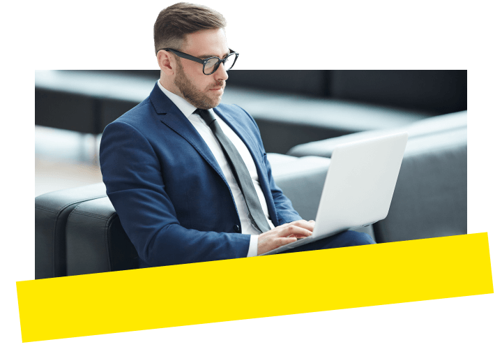 A lawyer using a laptop to coordinate and collaborate effectively with the legal team.